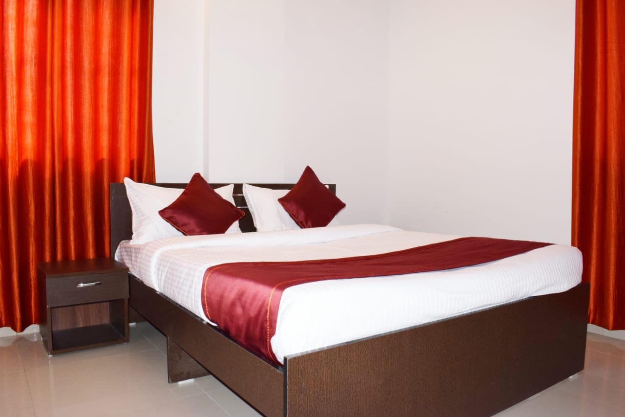 Sayee Hospitality | Deluxe Room